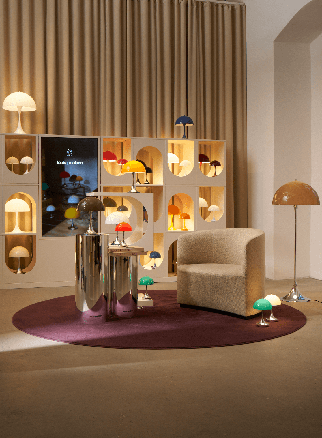 Panthella floor and table lamps in Original colours in showroom display, © 2025 Louis Poulsen.