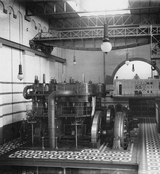 Historic Danish power station interior with early pendant lighting installation, © 2025 Louis Poulsen.